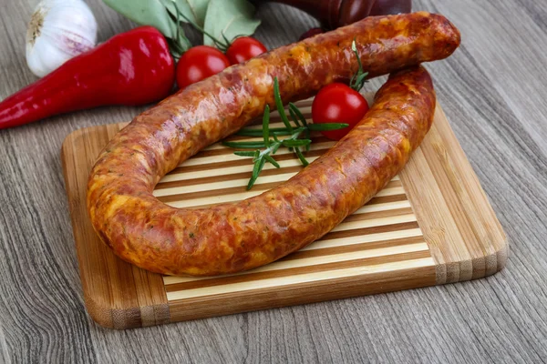 Sausage ring with rosemary — Stock Photo, Image