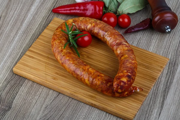 Sausage ring with rosemary — Stock Photo, Image