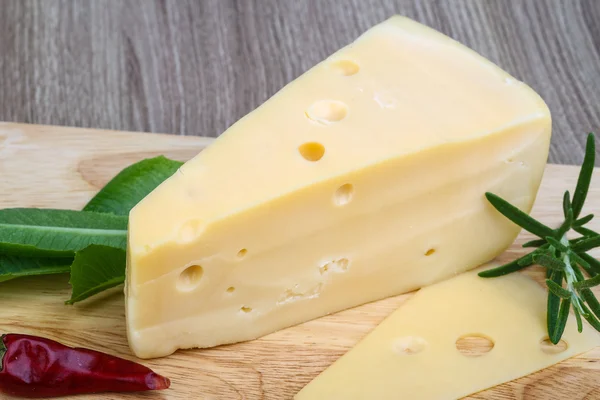 Triangle yellow cheese — Stock Photo, Image