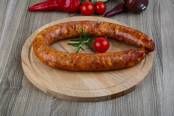 Sausage ring with rosemary — Stock Photo, Image