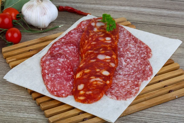 Salami sausage with parsley — Stock Photo, Image