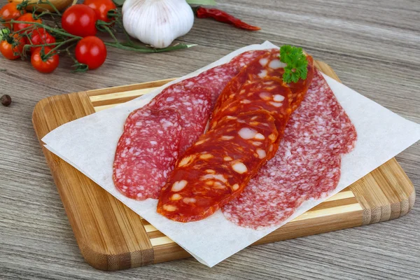 Salami sausage with parsley — Stock Photo, Image