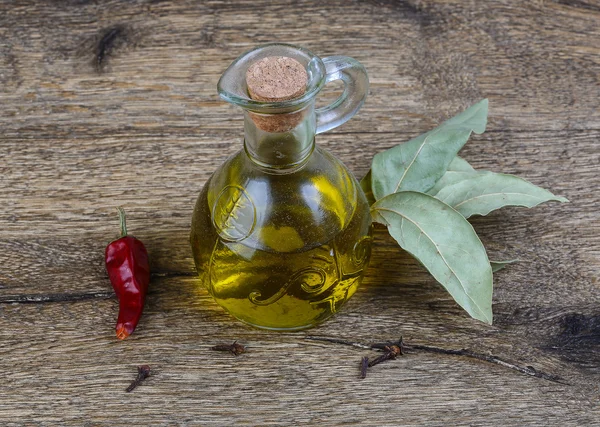 Olive oil with laurel leaves