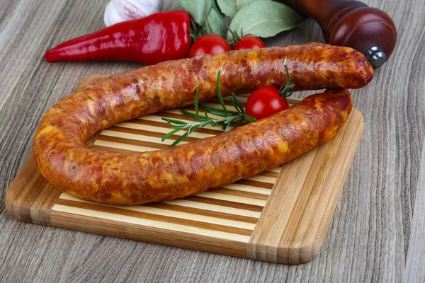 Sausage ring with rosemary — Stock Photo, Image