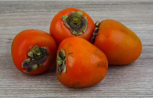 Ripe juicy Persimmon fruits — Stock Photo, Image