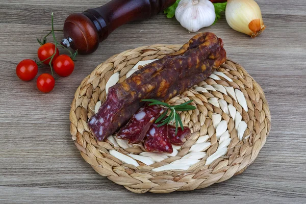 Salami sausage with rosemary — Stock Photo, Image