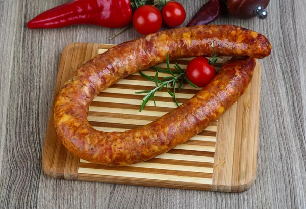 Sausage ring with rosemary — Stock Photo, Image