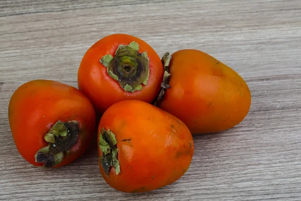 Frutos de caqui suculentos maduros — Fotografia de Stock