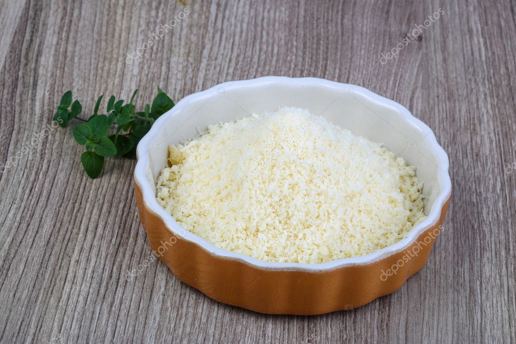 Shredded parmesan cheese — Stock Photo © AndreySt 92056276