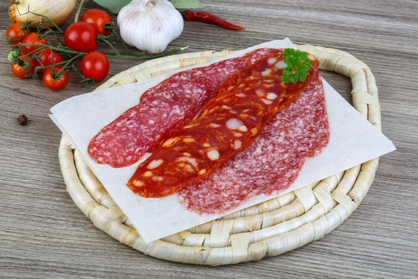 Salami sausage with parsley — Stock Photo, Image