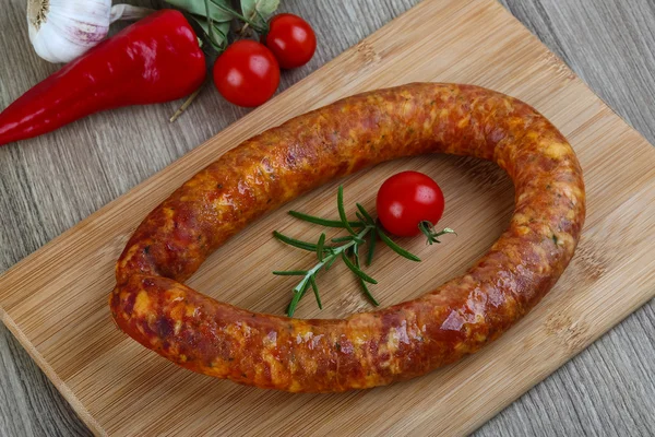 Sausage ring with rosemary — Stock Photo, Image