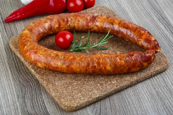 Sausage ring with rosemary — Stock Photo, Image