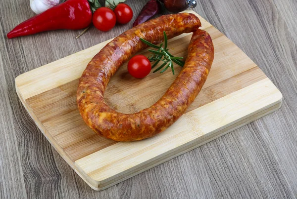 Sausage ring with rosemary — Stock Photo, Image