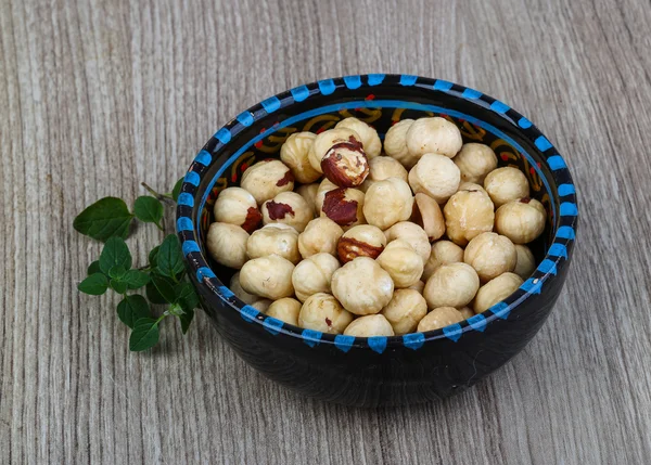 Raw Hazelnuts in the bowl — Stock Photo, Image