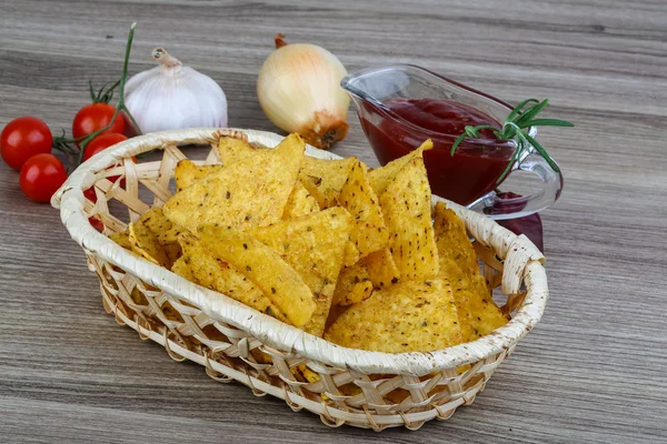 Nachos chips with tomato — Stock Photo, Image