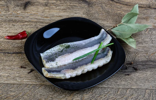 Herring fillet with dill — Stock Image Herring fillet with dill Royalty Free Stock Images