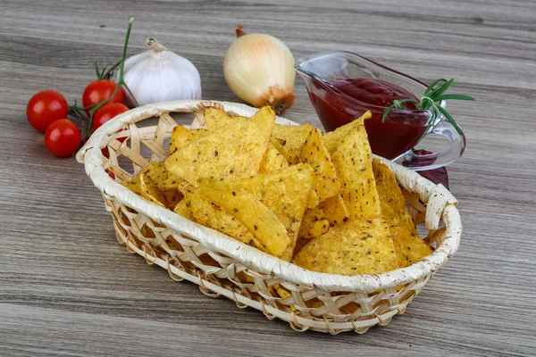 Nachos chips with tomato sauce — Stock Photo, Image