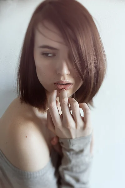 Portrait of beautiful woman covering face with palm — Stock Photo, Image