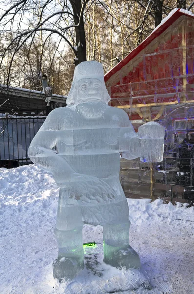 Exhibition of ice sculptures: a man with a mug of beer, came out