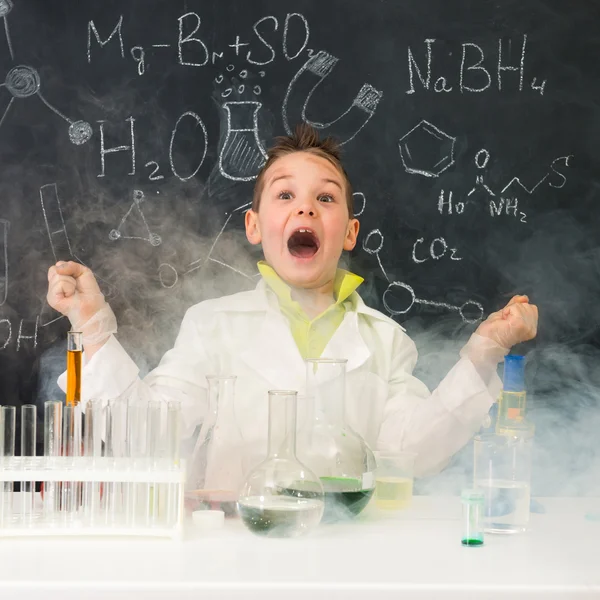 Pop-eyed funny boy after chemical experiment in lab — Stock Photo, Image