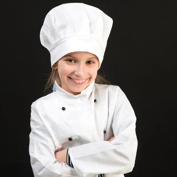 Chica sonriente en traje de chef blanco —  Fotos de Stock