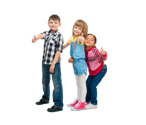 Three smiling little children standing together — Stock Photo, Image