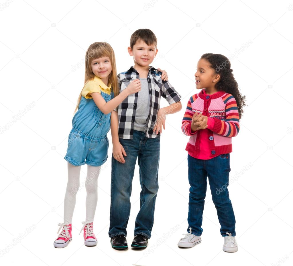 Three smiling little children standing together Stock Photo by ©tan4ikk 106343978