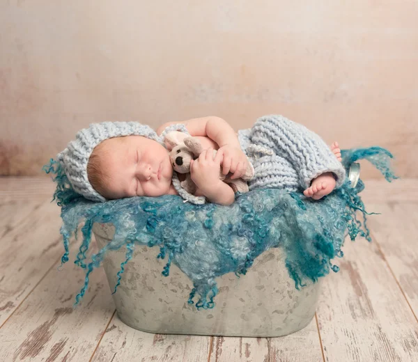 Beautiful newborn baby sleeping on woolen blanket — Stock Photo, Image