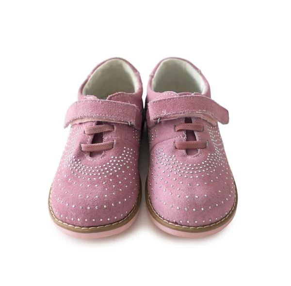 Красиве рожеве дитяче взуття — стокове фото