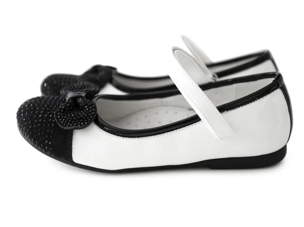 Adorável preto e branco sapatos para menina — Fotografia de Stock