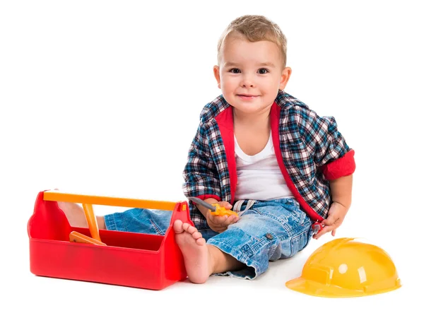 Μικρό αγόρι που παίζει το παιχνίδι εργαλεία — Φωτογραφία Αρχείου