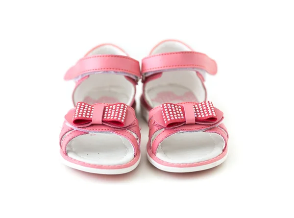 Tiny pink sandals with bow — Stock Photo, Image