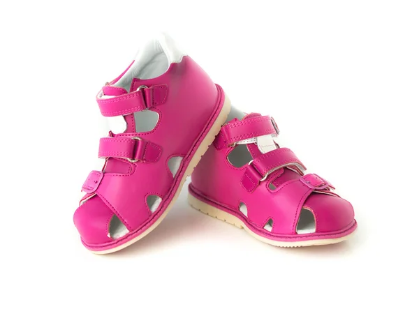 Яскраві рожеві сандалі для дітей — стокове фото