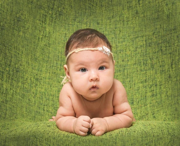 Two-month-old girl with decoration on a head — Stock Photo, Image