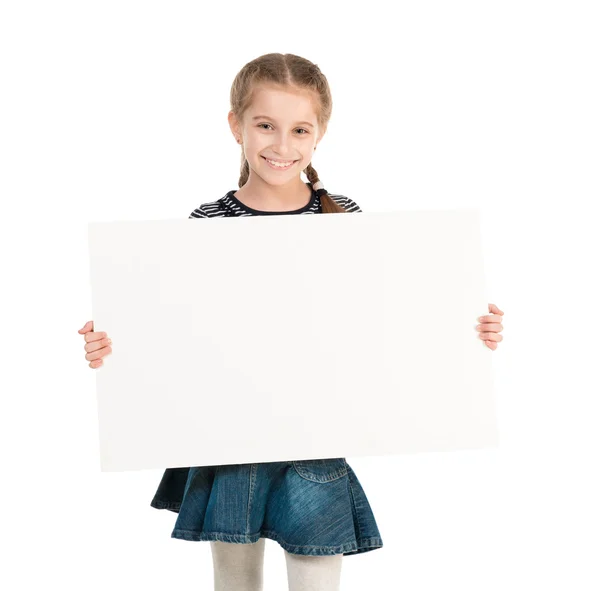 Pretty schoolgirl with blank sheet in hands — Stock Photo, Image
