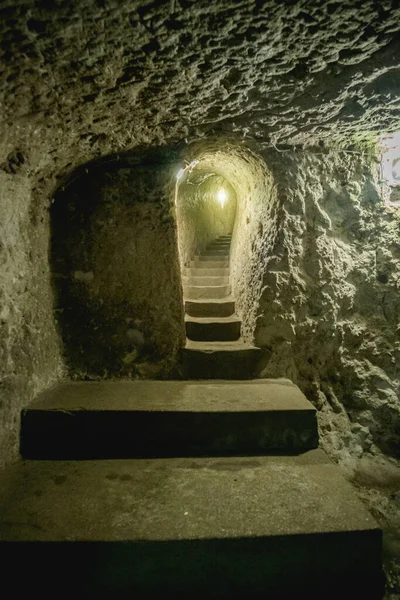 Stairs into cave underground city