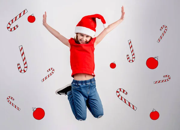 Bambina che salta in schizzi di Natale — Foto Stock