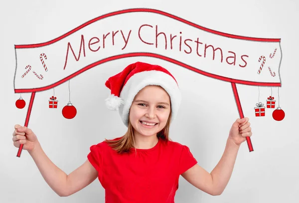 Niña sosteniendo alegre lema de Navidad — Foto de Stock