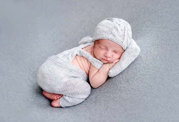 Charming newborn sleeping on tiny pillow — Stock Photo, Image