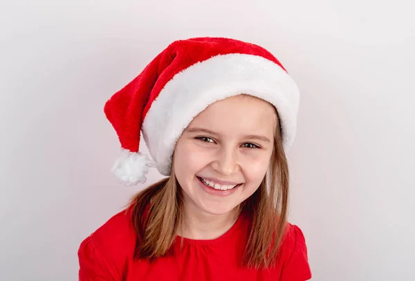 Portrait of little girl in santa hat — Stock Photo, Image