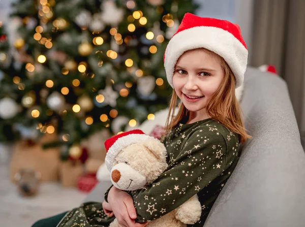 Little girl near christmas tree — Stock Photo, Image