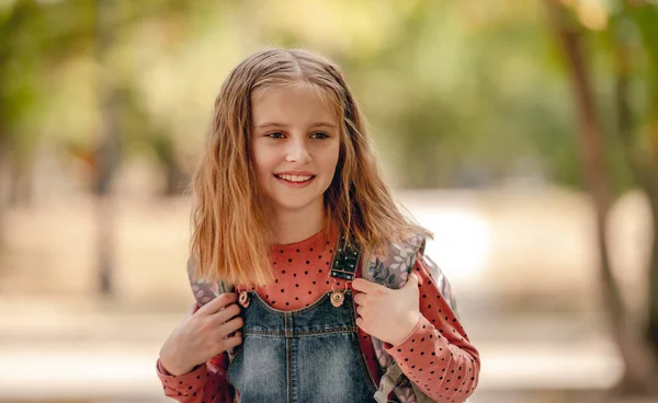 Preteen school girl with backpack — Stock Photo, Image