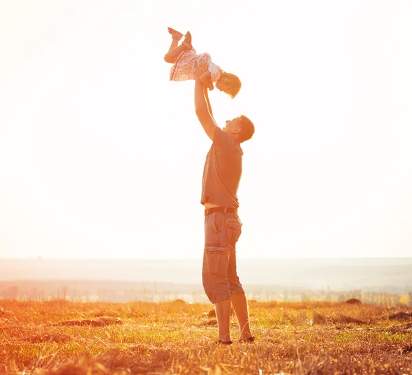 Dad playing with baby daughter — Stock Photo, Image