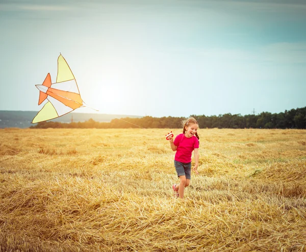 Krásná holčička s kite — Stock fotografie