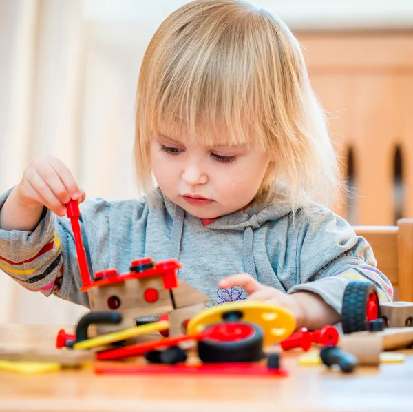 Girl playing with constructor — Stock Photo, Image
