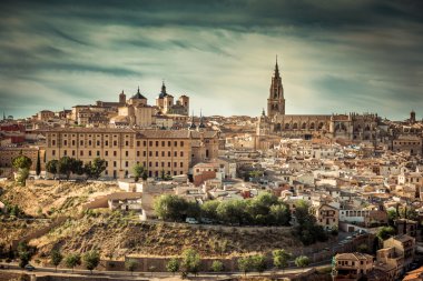 Toledo over sunset in Spain clipart