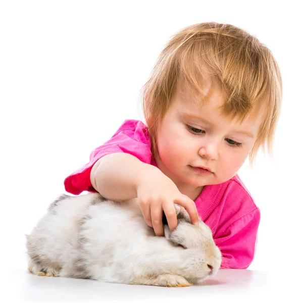 Baby girl  with her rabbit — Stock Photo, Image