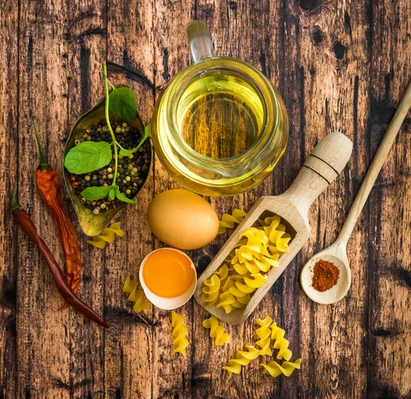 Uncooked pasta and spices — Stock Photo, Image