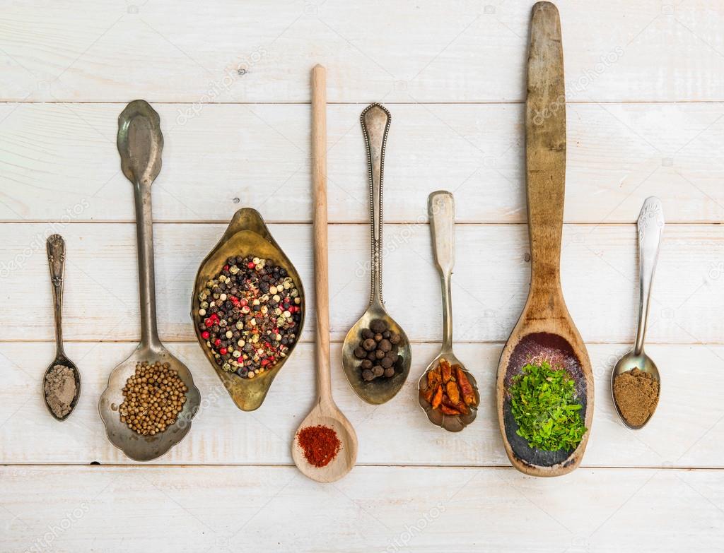 Spoons with herbs and spices