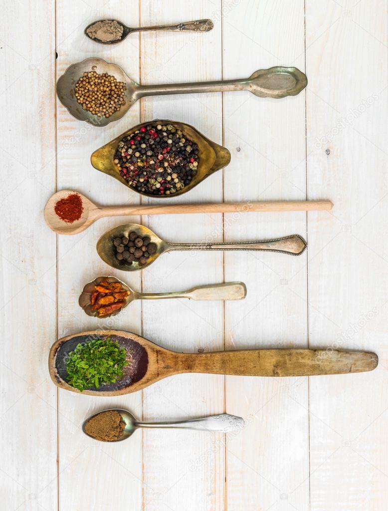 Spoons with herbs and spices